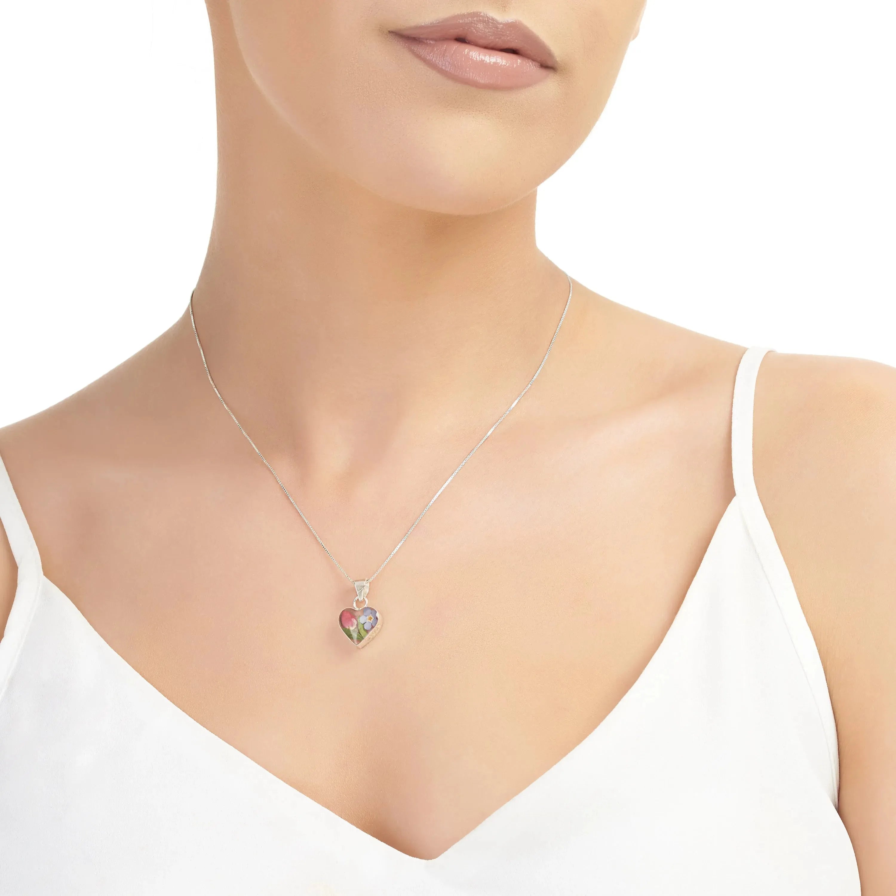 Ciondolo a forma di cuore in argento sterling con un vero non ti scordar di me e una miniatura di rosa