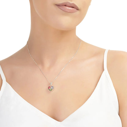 Ciondolo a forma di cuore in argento sterling con un vero non ti scordar di me e una miniatura di rosa