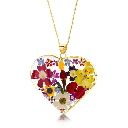 Sterling silver heart necklace handmade with real flowers by Shrieking Violet